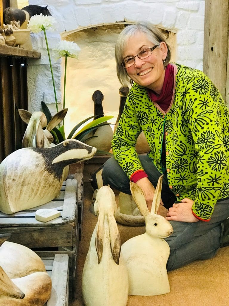 Sarah looking her work - Sarah D'Arcy Ceramics Sarah looking her work